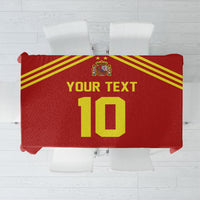 Red tablecloth with Spain crest and yellow text 'YOUR TEXT 10' graphic, folded