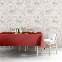 Red football tablecloth with yellow stripes, spread on dining table with chairs