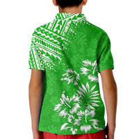Kids green polo shirt back view with white floral and geometric Polynesian print
