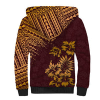 Sherpa hoodie back with maroon base, tan geometric print and yellow palm flowers