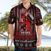 Black Christmas Hawaiian shirt, red Krampus artwork with 'Merry Krampus' and patterned hem