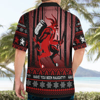 Black Christmas Hawaiian shirt with red Krampus on back and festive snowflake border