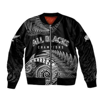Black bomber jacket with full-zip front and large white fern-and-spiral graphic