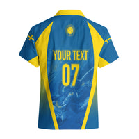 Blue Hawaiian football shirt with yellow trim; YOUR TEXT and 07 on back