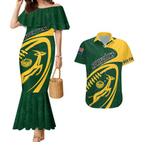 Green mermaid off-shoulder dress and rugby polo shirt with Springboks graphic and flag patches