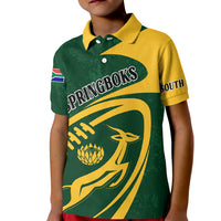 Kids green and yellow polo shirt with front graphic, collar, and sleeve South Africa flag