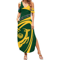 Women's green maxi dress with yellow rugby graphic print and side slit