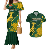 Matching mermaid dress and green Hawaiian shirt set with South Africa Champions graphic