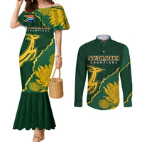 Green off-shoulder mermaid dress and green long-sleeve button shirt with gold graphic