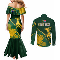 Green off-shoulder mermaid dress and green long-sleeve button shirt, gold flag back print