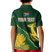 Kids green polo shirt back with 'YOUR TEXT' and gold South Africa map, springbok & flowers