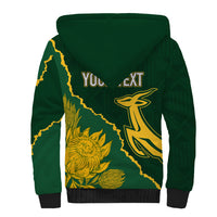 Green sherpa-lined zip hoodie back with yellow map and rugby player print