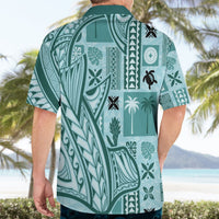 Teal Hawaiian shirt back view, camp collar and tapa-style geometric pattern print.