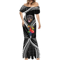 Black mermaid dress with off-shoulder ruffle, full-length Polynesian motif, and Rottweiler face