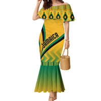 Yellow mermaid dress with green off-shoulder kente pattern and ruffled hem