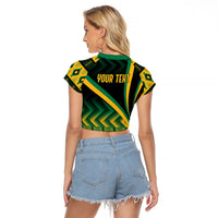 Back of black cropped raglan T-shirt with green and yellow Kente pattern and YOUR TEXT