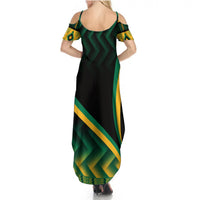 Women's open-back maxi dress with green, yellow, and black kente-style pattern
