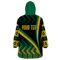Wearable blanket hoodie with green hood, kente pattern back and customizable text area