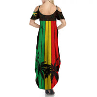 Women’s back view off-shoulder maxi dress with vertical reggae stripes and palm print