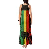 Women’s tank maxi dress back view, vertical reggae stripes with palm tree graphic