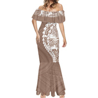 Brown off-shoulder mermaid maxi dress with white tropical print and flared hem