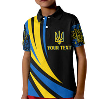 Kids black polo shirt with blue button placket and yellow/blue graphic crest front