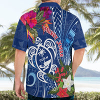 Blue Hawaiian shirt back view with 'Merry Xmas' and Guam emblem, short sleeves