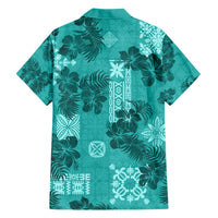 Teal short-sleeve button-up shirt with camp collar and tropical floral leaf pattern.