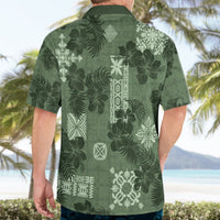 Mens sage green Hawaiian button-up shirt back view with dark foliage and white geometric details