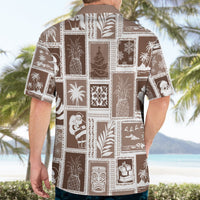 Brown patchwork Hawaiian shirt back view with white holiday print blocks and short sleeves
