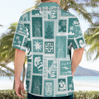 Teal Hawaiian shirt back with white patchwork squares and tropical icons, short sleeves