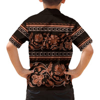 Kids Hawaiian shirt back: black with orange-brown floral ornament and patterned border.