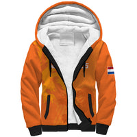 Orange sherpa-lined zip hoodie with black trim and Netherlands flag patch on sleeve