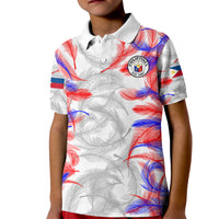 Kids football polo shirt, white with red and blue feather floral print, button collar