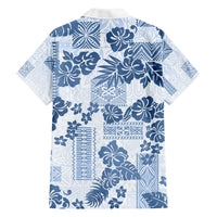 Blue and white Hawaiian print button-up shirt, back view with floral and tribal motifs