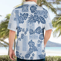 Blue and white Hawaiian print button-up shirt, back view with large floral and geometric motifs