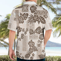 Vintage Hawaiian button-up shirt, back view; cream with dark brown tribal floral print