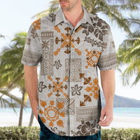 Adult short-sleeve button-up Hawaiian shirt, white with orange and brown tribal pattern