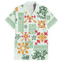 Light green Hawaiian shirt with multicolor floral tapa quilt pattern, short sleeves