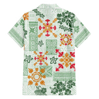 Light green Hawaiian shirt back with multicolor tapa quilt and floral patchwork, short sleeves