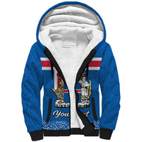 Blue sherpa hoodie with white fleece hood lining and Iceland-themed front print