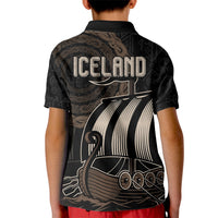 Kids black polo shirt with large back print of Viking ship and 'ICELAND'