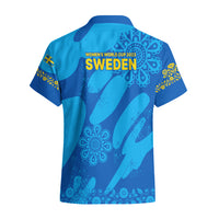 Women's blue Sweden football Hawaiian shirt, 'SWEDEN' on back, blue floral patterns