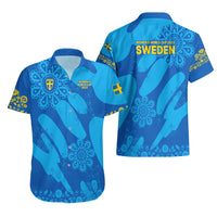 Two women's blue Sweden football Hawaiian shirts shown: front with crest, back with 'SWEDEN'