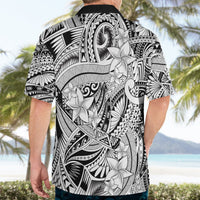 Black and white Hawaiian shirt back view on model, short sleeves with tribal flower print