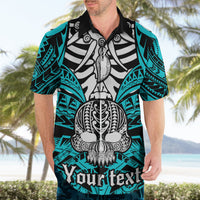 Aqua Hawaiian shirt with black collar, boar skull tusk graphic, short-sleeve tribal print