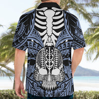 Blue Hawaiian shirt on model showing back print with tribal skull and boar tusk
