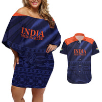 Blue off-shoulder short dress with orange trim, matching men’s button-up shirt, printed front