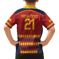 Kids red football-style polo shirt with yellow collar, Spain crest, and bold graphic print
