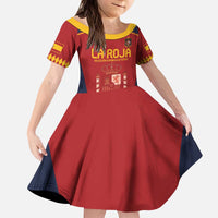 Kids red short-sleeve soccer dress with yellow collar trim, navy accents, crest graphic front